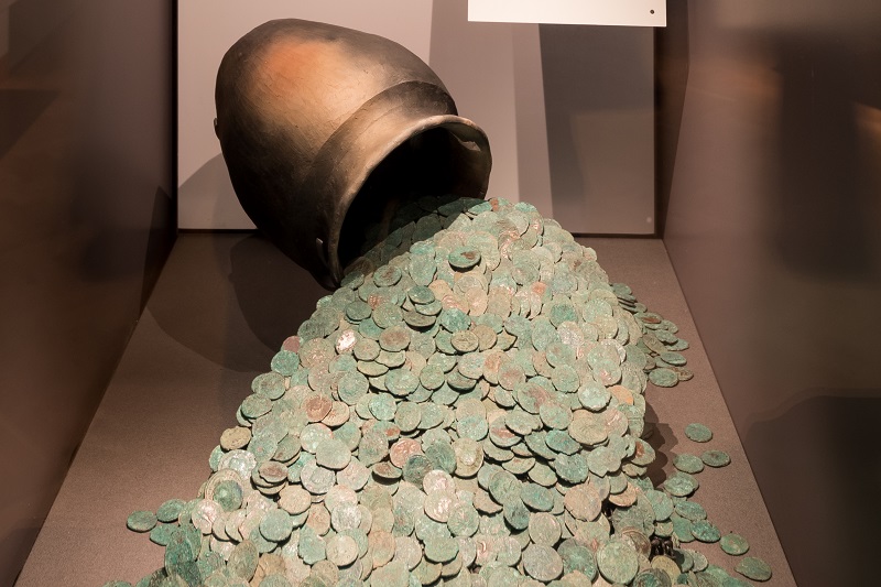 A pot filled with 4,500 Roman coins buried around 293 AD.